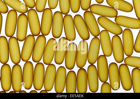 Fish oil gel pills laying on white background Stock Photo