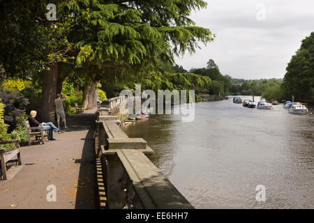 UK, London, Twickenham, people relaxing beside beside River Thames Stock Photo