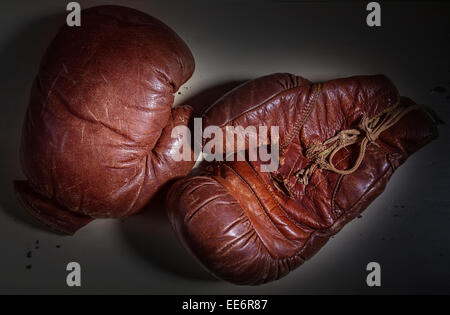 Old leather boxing gloves circa 1930. Stock Photo