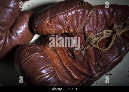 Old leather boxing gloves circa 1930. Stock Photo