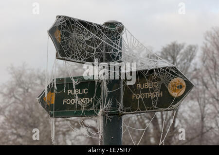 Footpath sign covered in winter frost Stock Photo