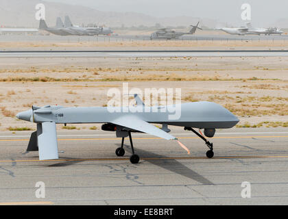 MQ-1 Predator unmanned aerial vehicle (UAV) on the runway at Bagram Air Base in Afghanistan, part of Operation Enduring Freedom. See description for more information. Stock Photo