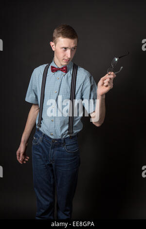 man in red  bow tie plaid shirt Stock Photo