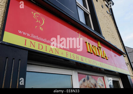 Indian take-away, also selling fish and chips, kebabs, pasta and burgers Stock Photo