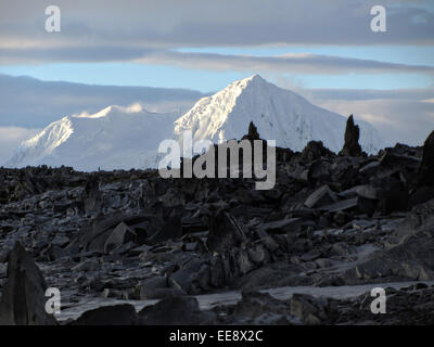 Snow covered Mount William viewed from Torgersen Island near the Antarctic Peninsula. Stock Photo