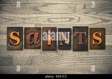 The word 'SAINTS' written in wooden letterpress type. Stock Photo