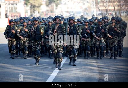 Kathmandu, Nepal. 14th Jan, 2015. Nepalese soldiers take part in a drill of gun for the upcoming Army Day at the Parade Ground in Tundikhel of Kathmandu, Nepal, on Jan. 14, 2015. © Pratap Thapa/Xinhua/Alamy Live News Stock Photo