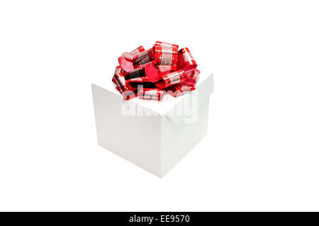 small gift with red ribbon isolated over white background Stock Photo