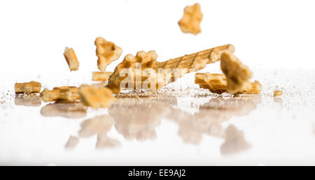 falling cookies on white background Stock Photo