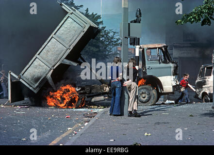 BELFAST, UNITED KINGDOM - August 1976, Young Nationalists during Riots in the Falls Road, West Belfast during the Troubles in 1976, Northern Ireland, Stock Photo