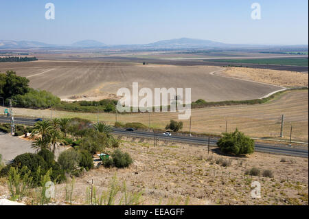 The Jezreel valley as seen from the ancient city Megiddo, left from the middle is mount Tabor Stock Photo