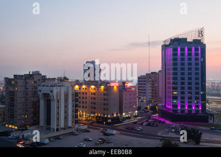 Hotel buildings in Kuwait City at night Stock Photo