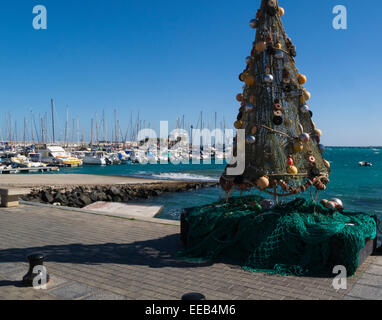 Decorated fishing net in Carralejo Harbour front Fuerteventura Canary Islands Stock Photo