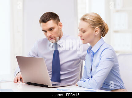 business team working with laptop in office Stock Photo