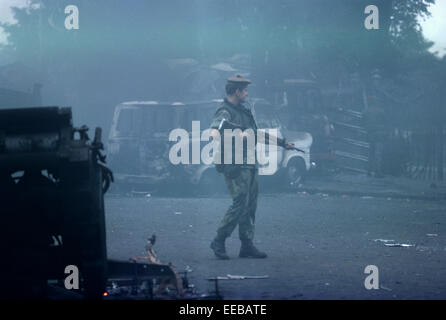 BELFAST, NORTHERN IRELAND - AUGUST 1976, British Army Troops during Rioting on the Falls Road, West Belfast, The Troubles, Northern Ireland. Stock Photo