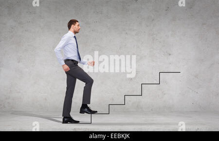 serious businessman stepping on step Stock Photo