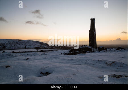 A winters morning as the sun rises over the old South Caradon Copper Mine Stock Photo