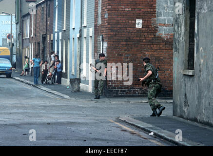 BELFAST, NORTHERN IRELAND - MAY 1973. British army soldiers patrolling streets of Nationalist West Belfast during The Troubles, Northern Ireland. Stock Photo