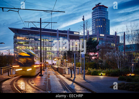 Metrolink tram stops at Media City UK in Salford Quays, home of the BBC and ITV, Granada. Stock Photo