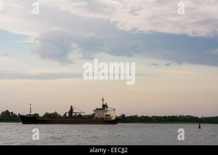 Ship on the water before the storm Stock Photo