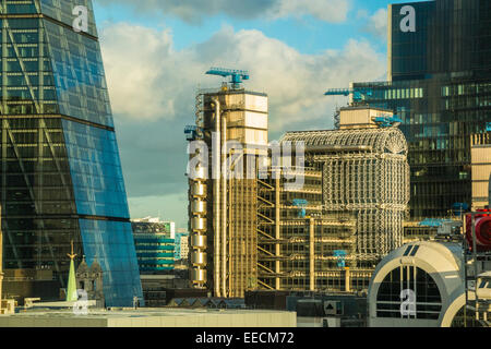 Sightseeing commercial property: the iconic Lloyds Building flanked by the Cheesegrater, Leadenhall Street, City of London insurance district, EC3, UK Stock Photo