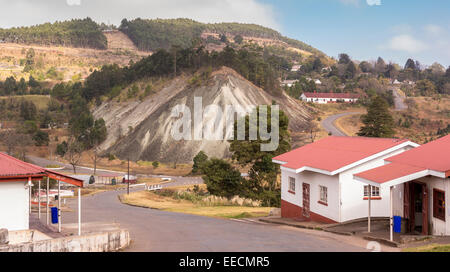 BULEMBU, SWAZILAND, AFRICA - Former asbestos mining town, now largely unoccupied, with mound of tailings. Stock Photo