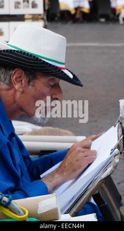 Piazza Navona, artist is sketching for visitors, Rome Italy Stock Photo