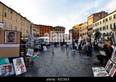 Piazza Navona, artist is sketching for visitors, Rome Italy Stock Photo