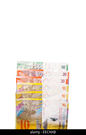 3 different denominations of official legal tender Swiss Franc paper currency notes layer stacked on a white background. Stock Photo