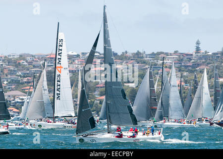 maxi yachts in sydney harbour preparing for the start of the 2014 sydney to hobart yacht race on boxing day,sydney,Australia Stock Photo