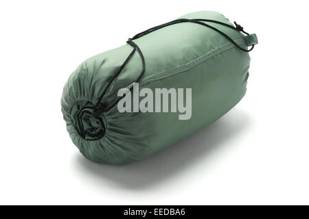 Sleeping Bag Packed In A Sack Lying On White Background Stock Photo