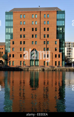 Modern brick and glass office building, 3 Muirfield Crescent, in London Canary Wharf financial district on Millwall Inner Dock Stock Photo