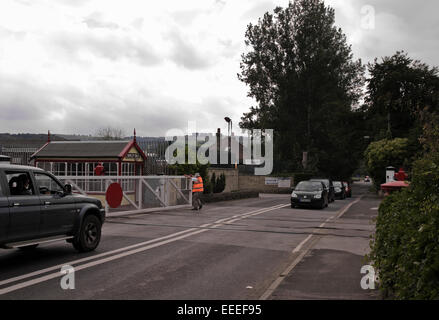 signal man opening / closing gate on level crossing at Darley Dale railway station Peak Rail Derbyshire