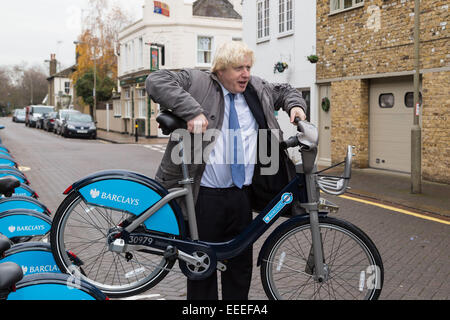 London Mayor Boris Johnson with a hire bike Stock Photo