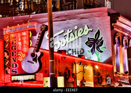 Signs for Tootsies, Legends and other honky-tonks on lower Broadway in Nashville, TN. Stock Photo