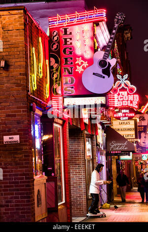 Neon signs for Tootsies, Legends Corner and other honky-tonks on lower Broadway in Nashville, TN. Stock Photo