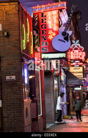 Neon signs for Tootsies, Legends Corner and other honky-tonks on lower Broadway in Nashville, TN. Stock Photo