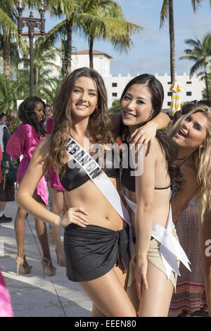 Doral, FL, USA. 14th Jan, 2015. Doral, FL: SALY GREIGE(Lebanon) and KEIKO TSUJI(Japan)contestants in the 63rd Annual Miss Universe Pageant, pose for photographers after the runway show held poolside at Trump National Doral Miami. © Andrew Patron/ZUMA Wire/Alamy Live News Stock Photo