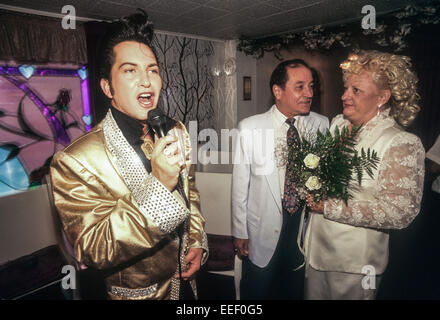 LAS VEGAS, NV – JULY 1: Newlywed couples get married in Las Vegas, Nevada on July 1, 1996. Stock Photo