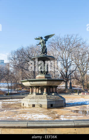 View of the Angel of the Waters Fountain sculpture at Bethesda Terrace in Central Park, Manhattan New York, USA in winter with a blue sky Stock Photo