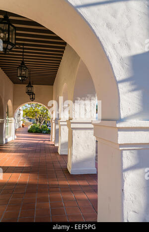 Repeated pattern of white stucco arches of the Wells Fargo building on Anacapa Street, Santa Barbara, CA in late afternoon light Stock Photo