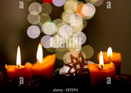 Advent wreath with four lit candles Stock Photo