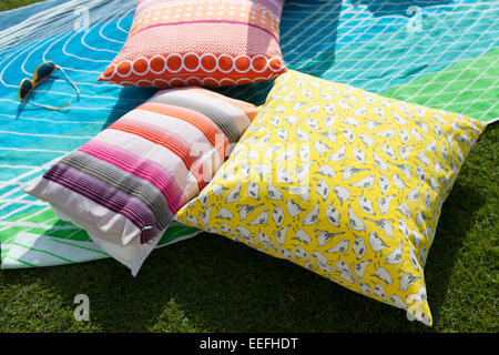 Colourful cushions and rug by Habitat Stock Photo