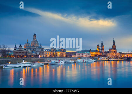 Dresden. Image of Dresden, Germany during twilight blue hour with Elbe River in the foreground. Stock Photo