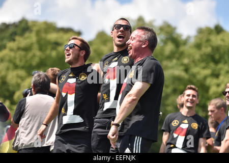 The Germany national football team celebrating their victory at Brandenburg Gate (Brandenburger Tor). 400,000 fans gathered at the so called Fanmeile to greet the winners of the 2014 World Cup.  Featuring: Lukas Podolski,Mario Götze,Miroslav Klose,Guests Stock Photo