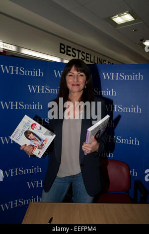 Davina McCall one of Britain's best loved TV Presenters poses with her new book during her book signing at WHSmith in Bromley Stock Photo