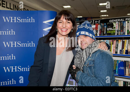 Davina McCall one of Britain's best loved TV Presenters poses with a fan during her book signing at WHSmith in Bromley Stock Photo