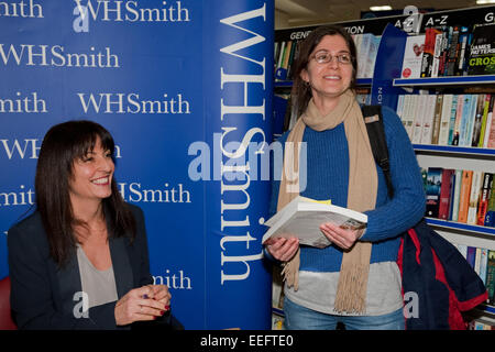 Davina McCall one of Britain's best loved TV Presenters poses with a fan during her book signing at WHSmith in Bromley Stock Photo