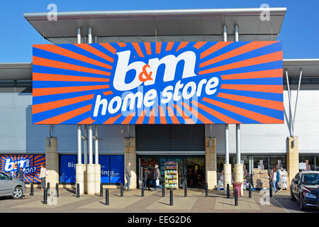 B&M Retail home store shopping business customer entrance below massive brand logo display at the Lakeside retail park West Thurrock Essex England UK Stock Photo