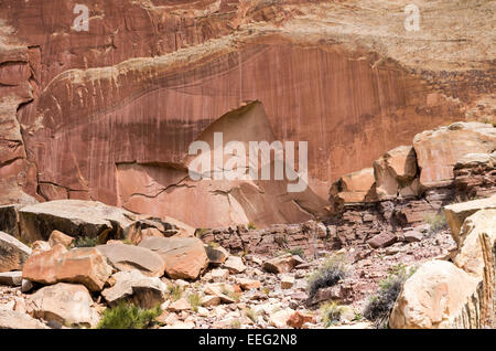 Petroglyphs on the wall of a cliff in Capitol Reef National Park in Utah. Stock Photo